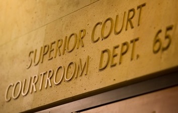 Image of a wall that says Superior Court Dept. 65